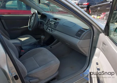 2003 Toyota Camry Le from USA, damaged, VIN 4T1BE32K23U674119